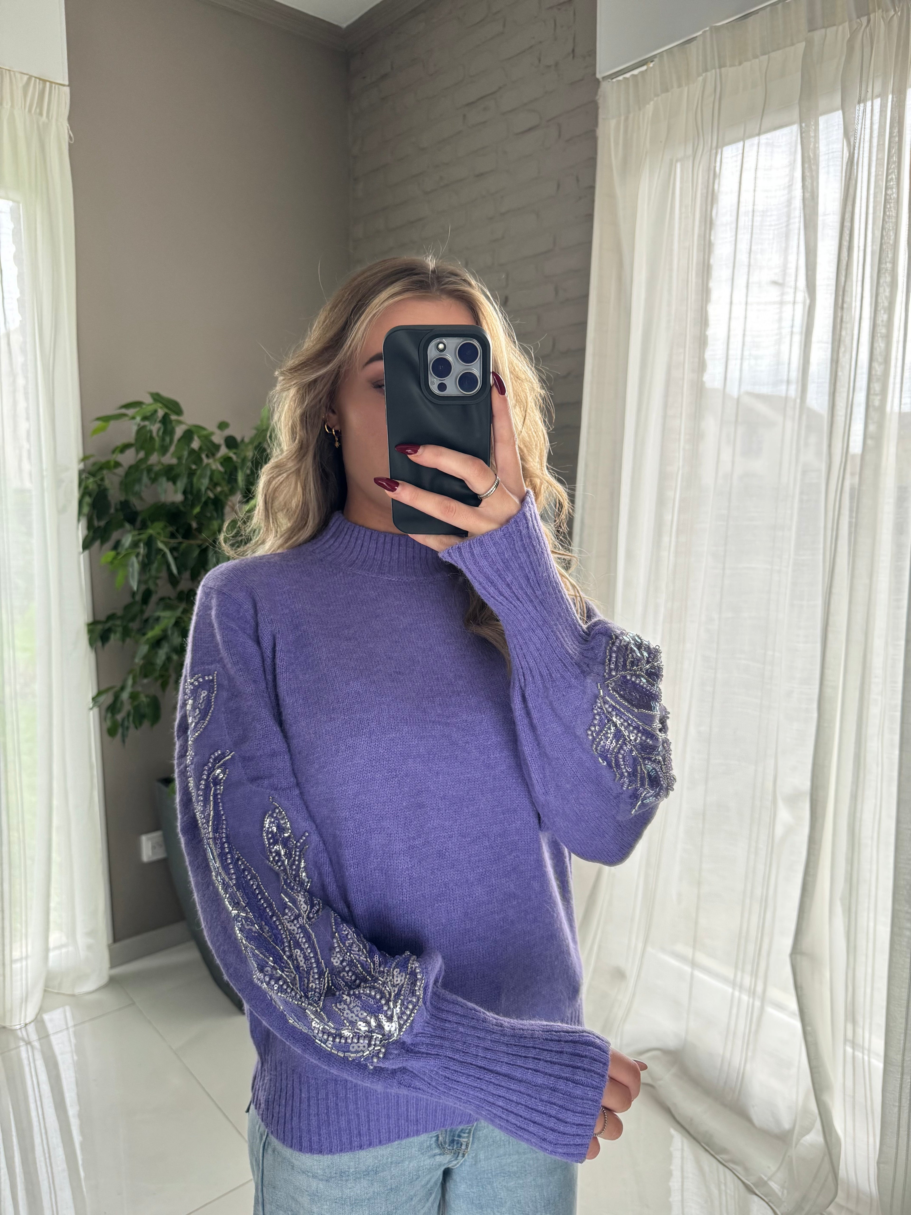 Pull violet détail manche