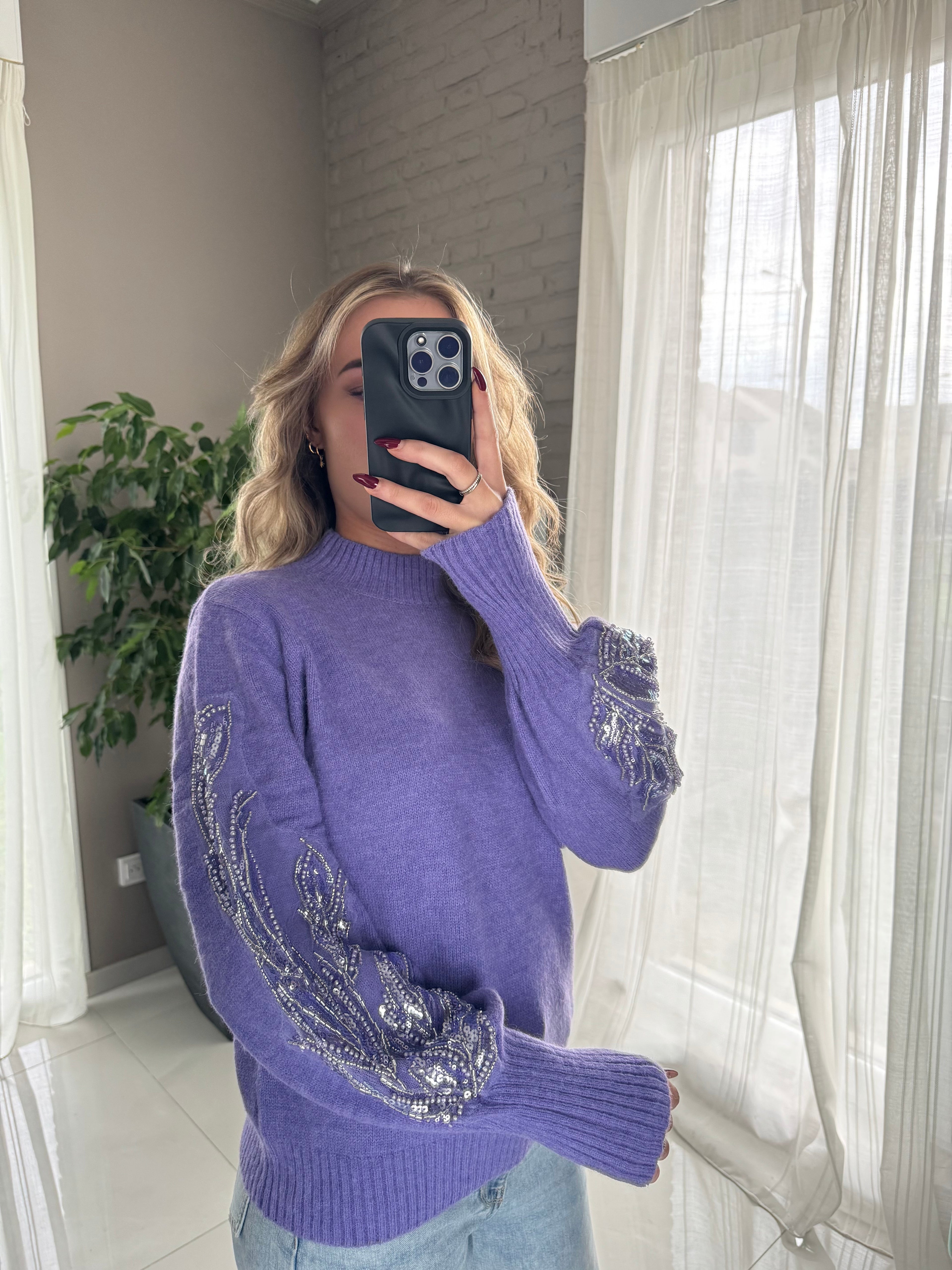 Pull violet détail manche