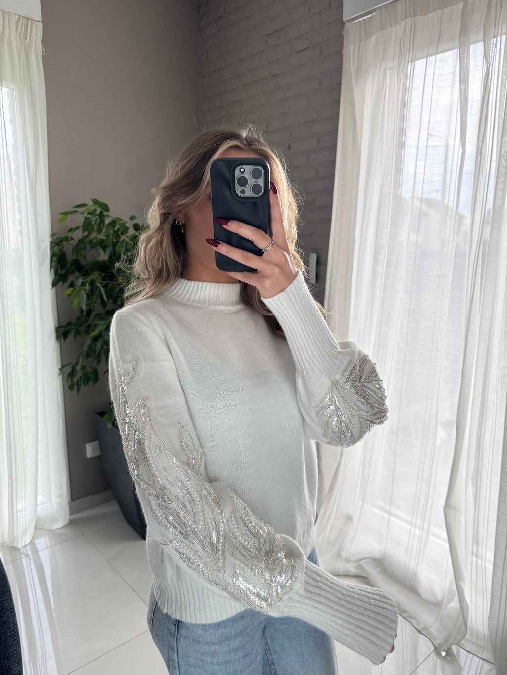 Pull blanc détail manche